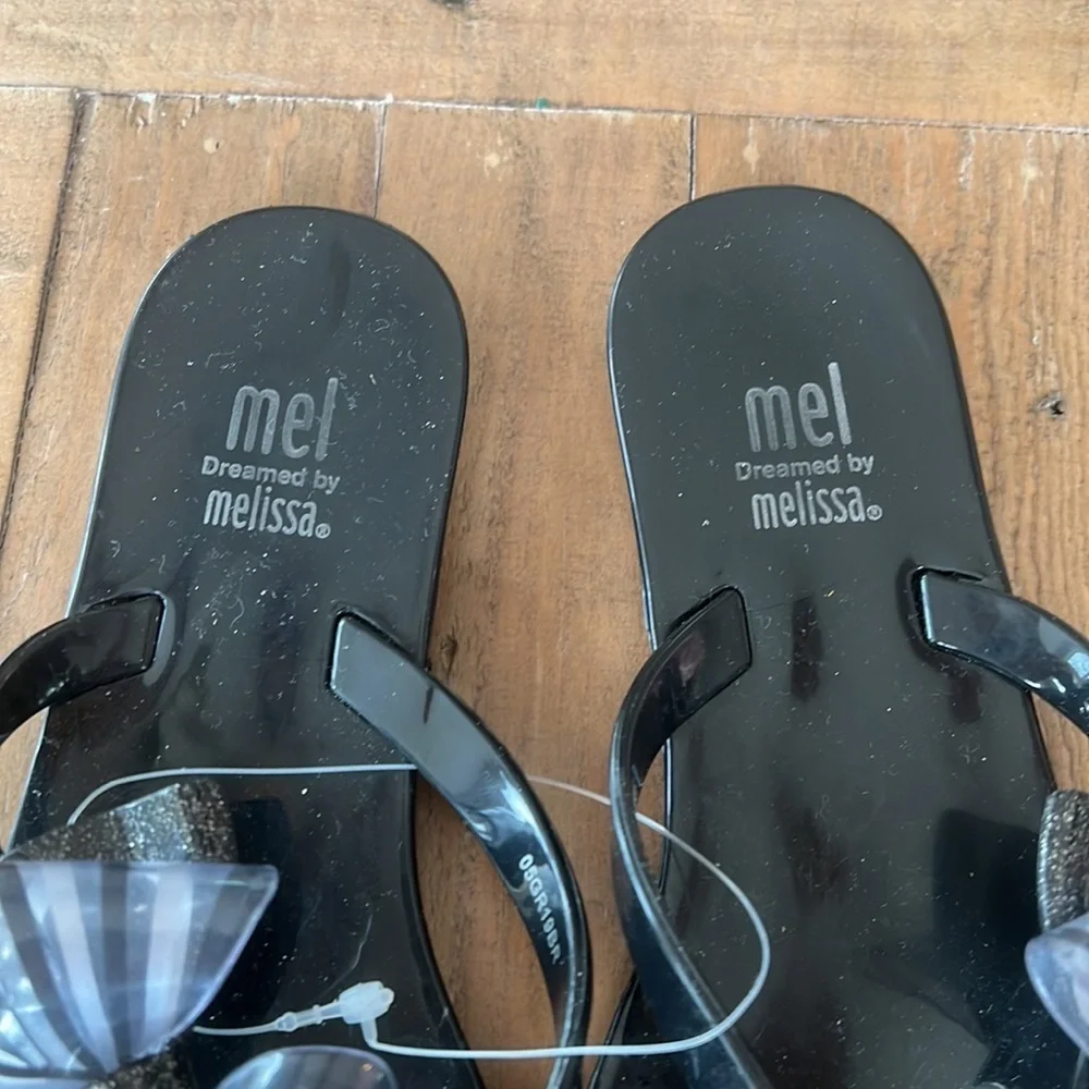 Mini Melissa Mel harmonic black bow flip flop sandals